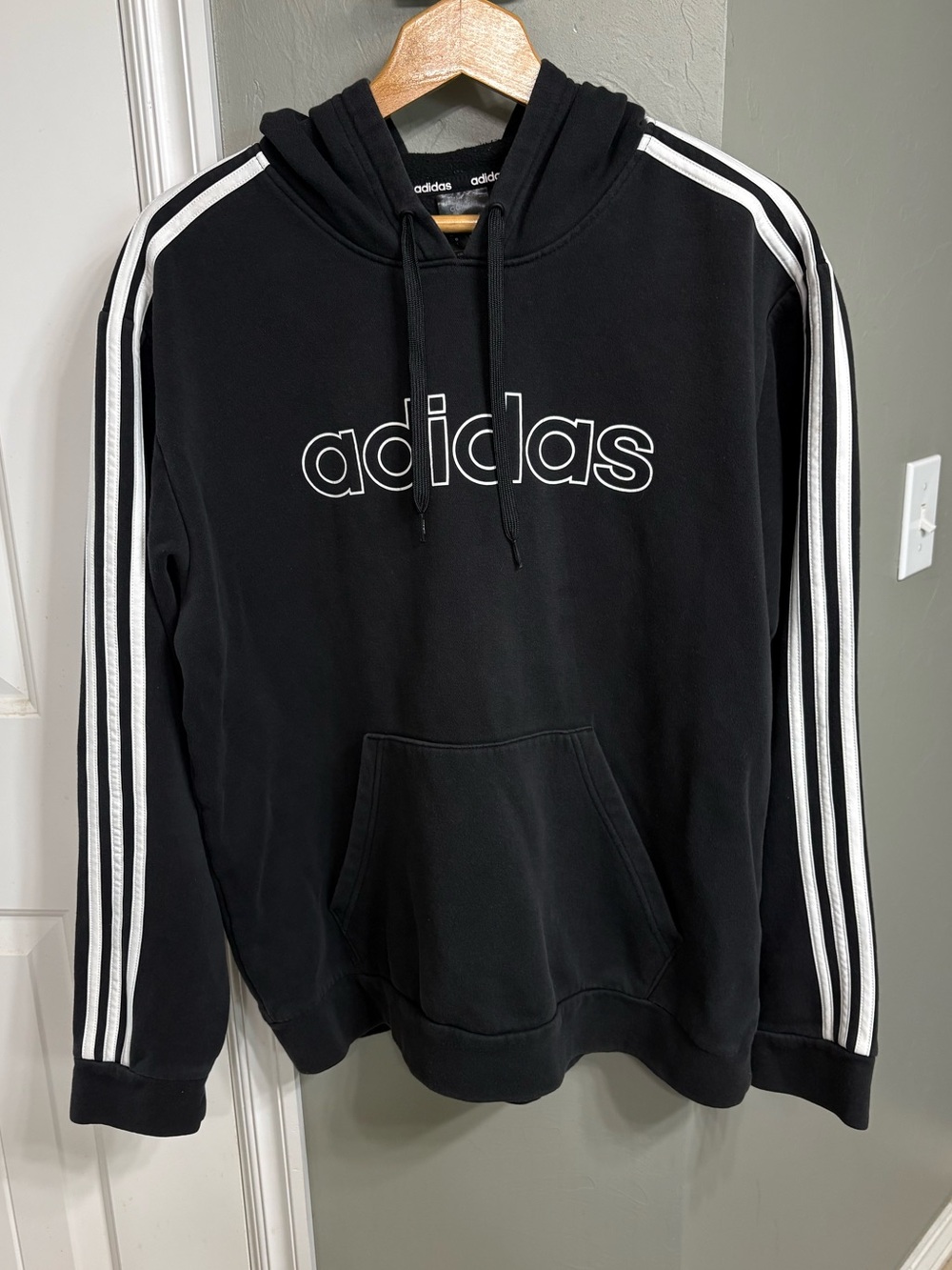 adidas Black Hoodie with White Three-Stripe Accents